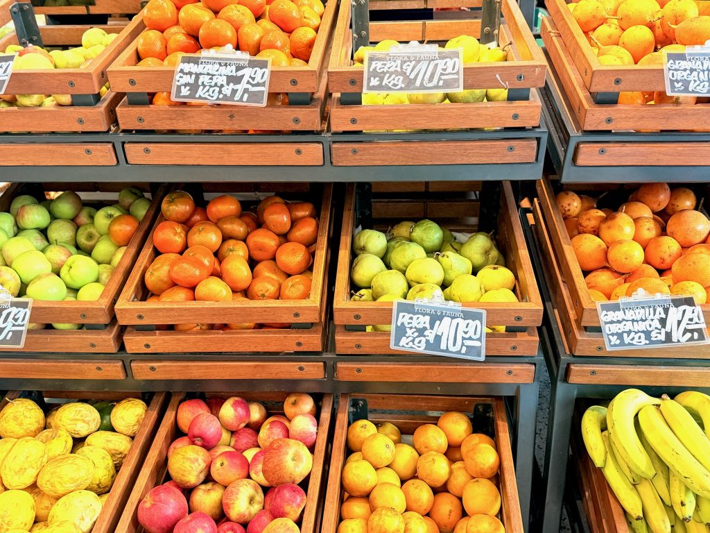 crates of a variety of fruit at Mercado de Surquillo, local market in lima peru