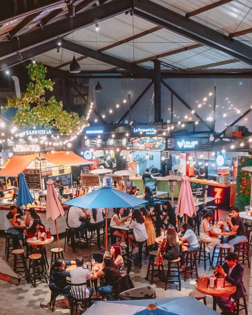 people dining indoors at Mercado 28 in lima peru