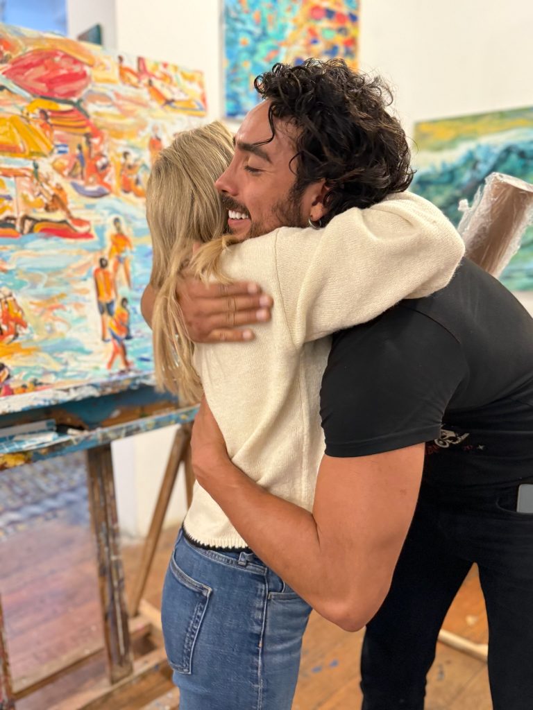 woman hugging Stefano Bermilion in lima peru