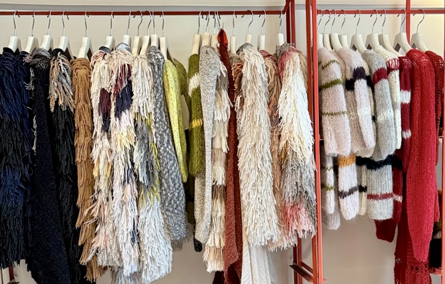 Alessandra Petersen alpaca sweater clothing rack in lima peru