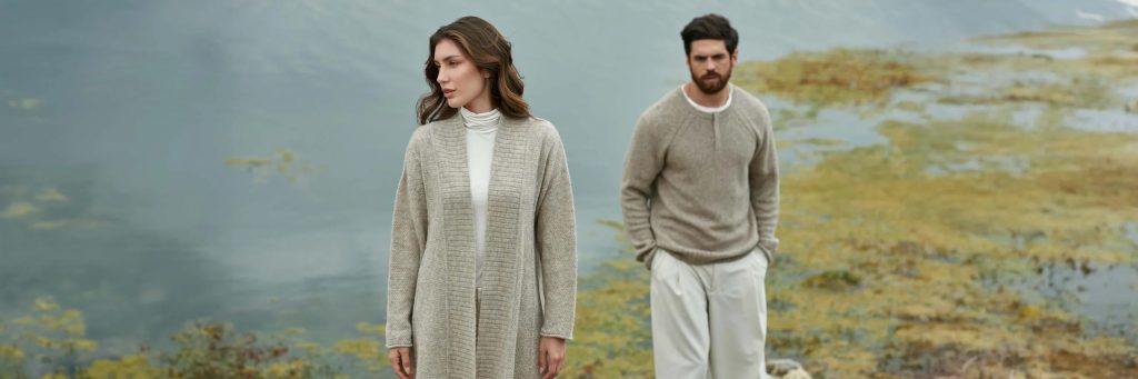 female and male models in sol alpaca sweaters, best alpaca brands in lima peru