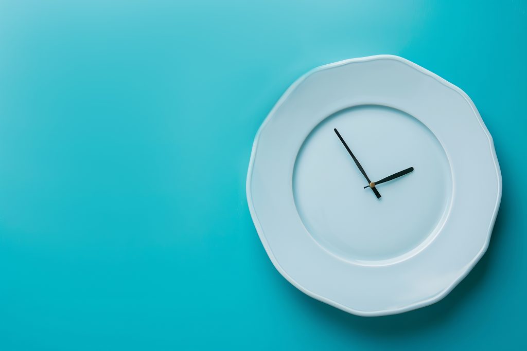 Clock face on a plate, blue background
