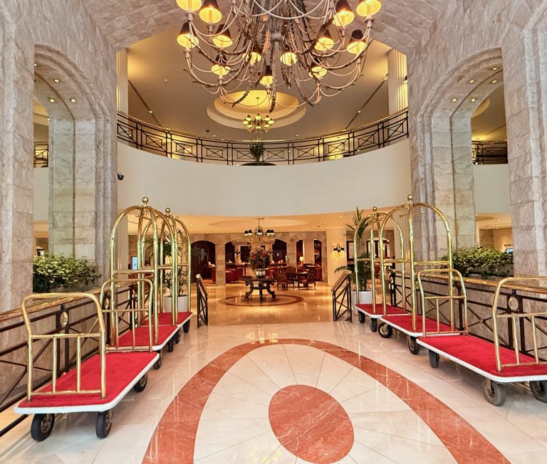 Grand Entrance to Swissotel Lima Lobby, marble floors shiny carts, balcony