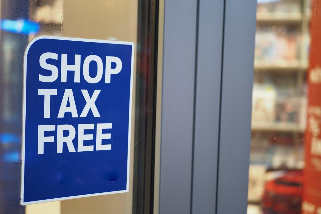 shop tax free text duty free shop sign on shop window