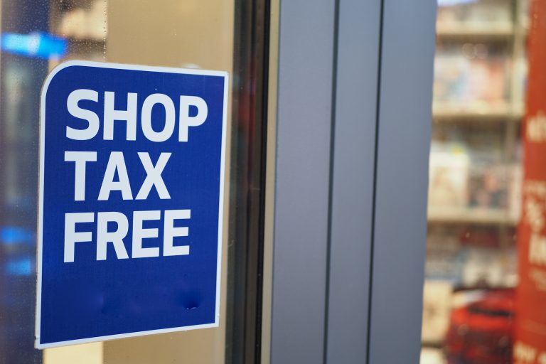 shop tax free text duty free shop sign on shop window