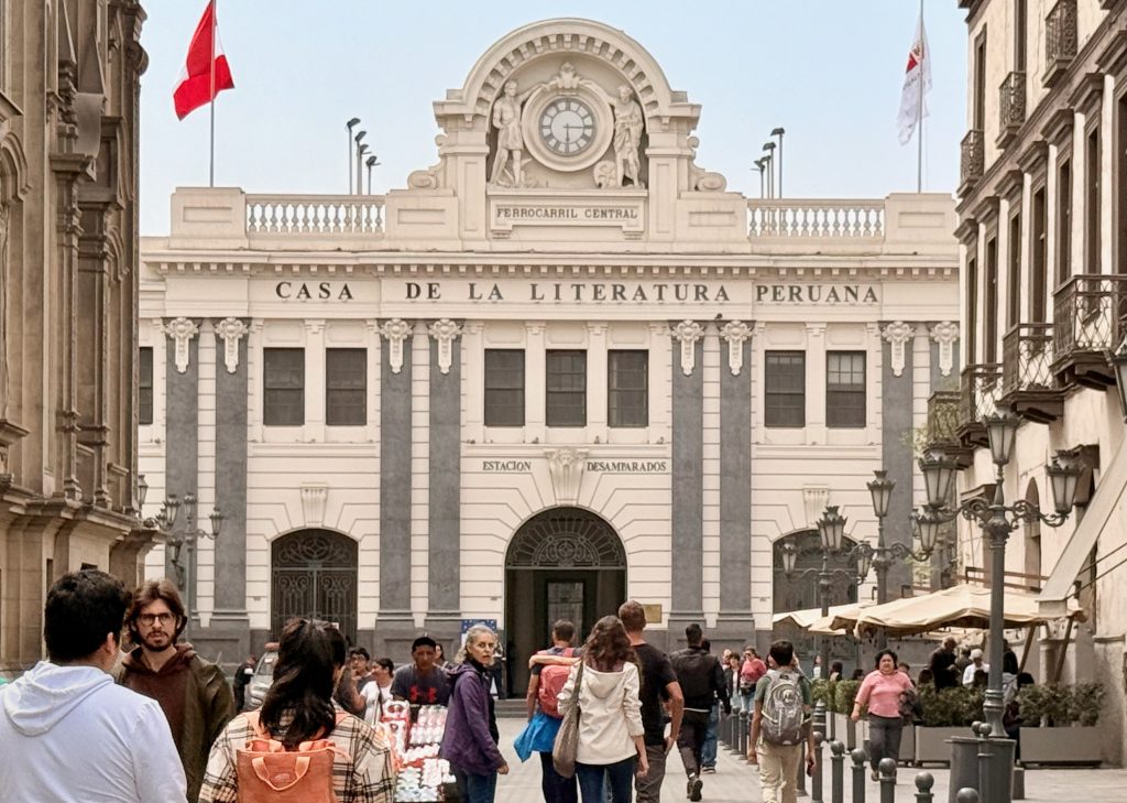 historic core in lima peru, crowd gathered near building
