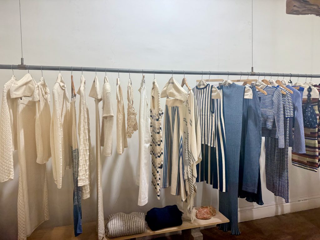 display rack of high quality, ethically sourced, and handmade clothes at Escvdo
