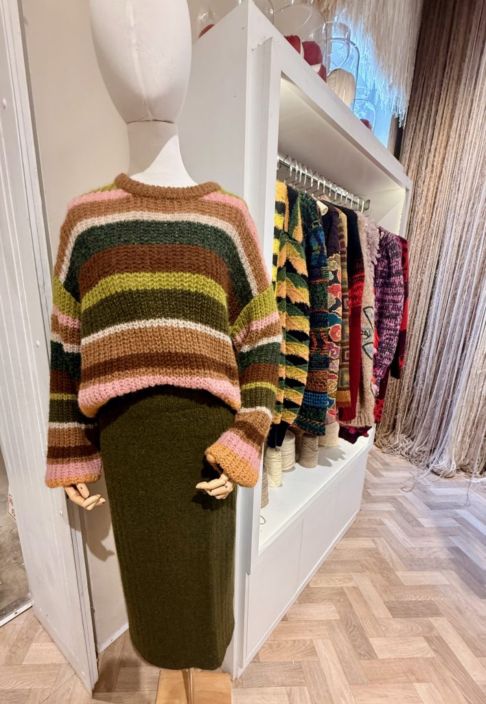 royal knit alpaca sweaters on display in store
