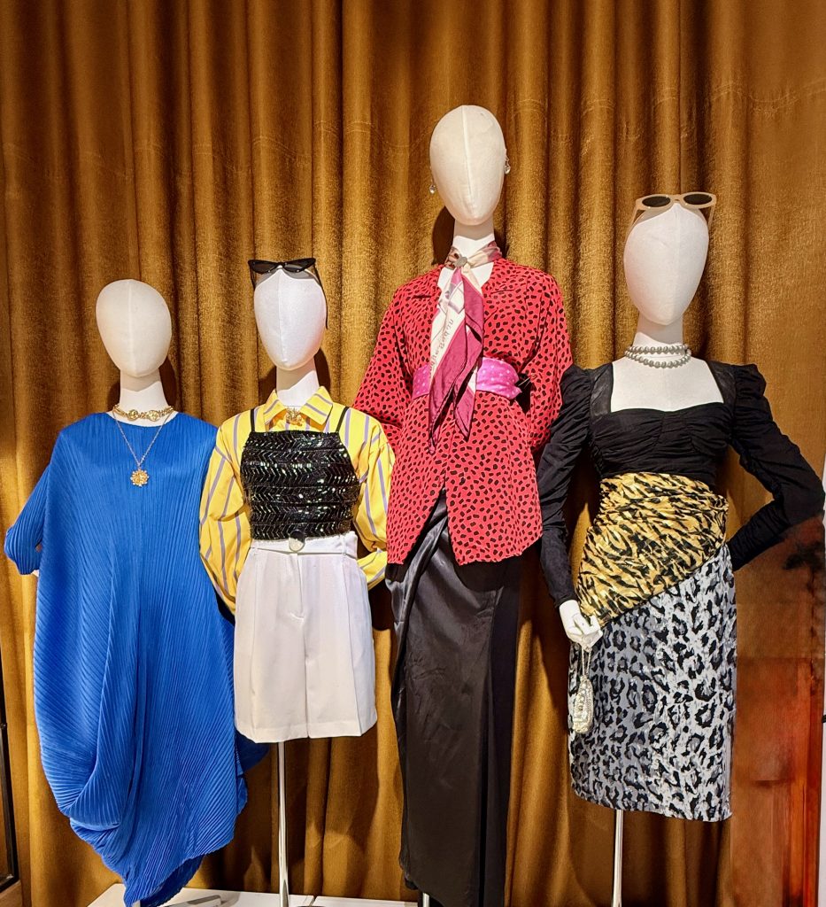 mannequins displayed with upcycled chic clothes at Infinity