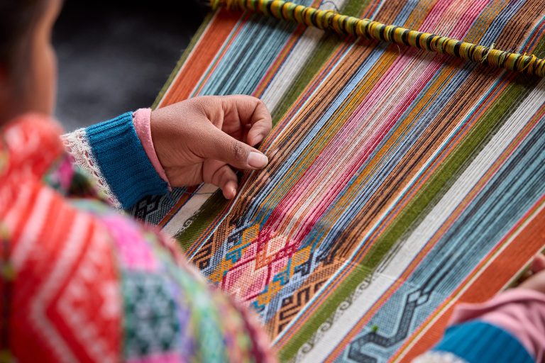 The hands of a weaver hold generations of skill, patience, and creativity, turning simple strands into works of art. Each weave is a journey, each knot a memory. Chinchero Cusco Peru.