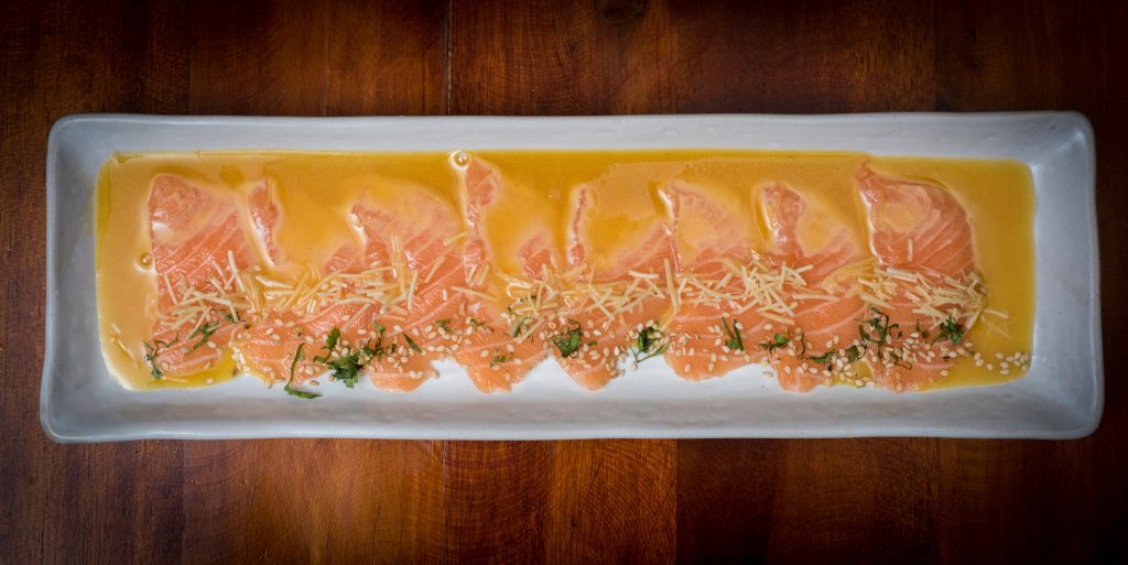 tiradito de salmon - Peruvian dish of raw fish, carpaccio