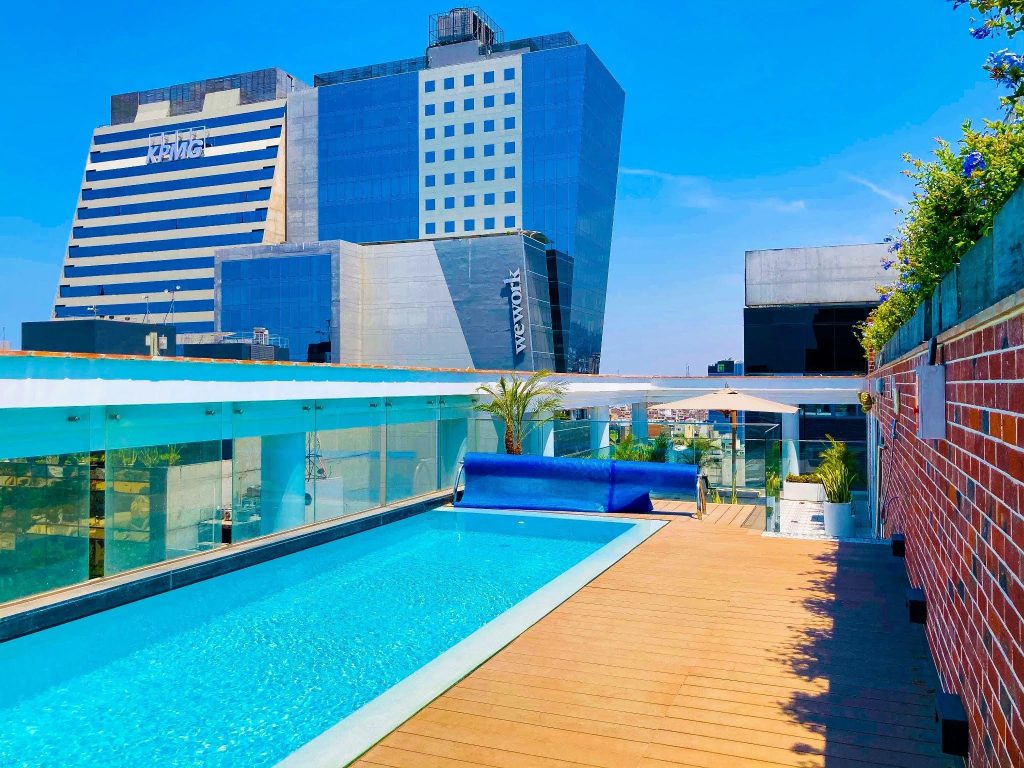 Casa Andina Premium San Isidro — The rooftop pool, with San Isidro's financial district as a backdrop