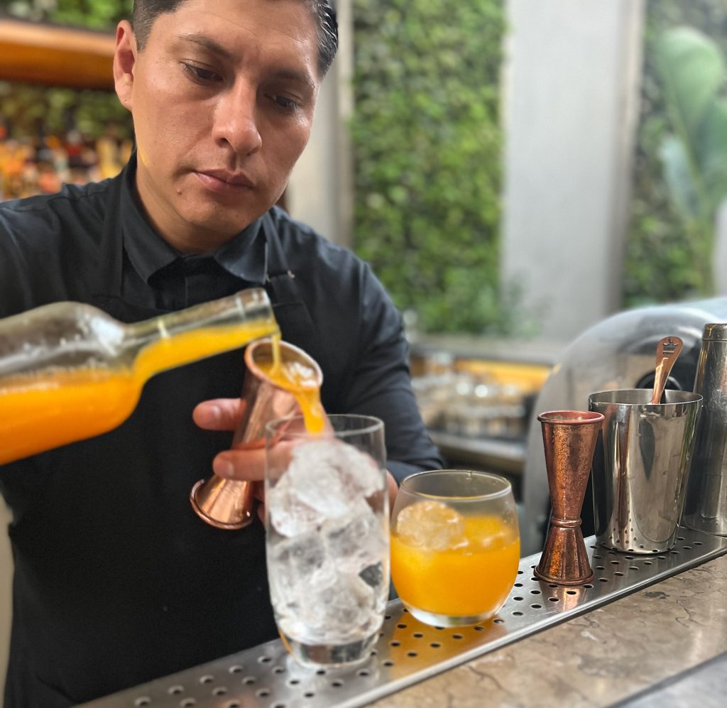 Osaka restaurant bartender pouring a drink