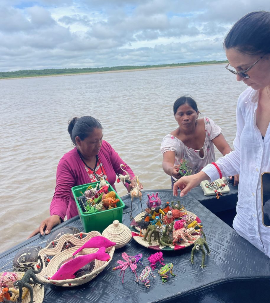 group of women, amazon artisans floating boutique
