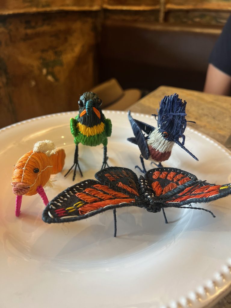 Hand-woven animal figurines at La Casa de Fierro