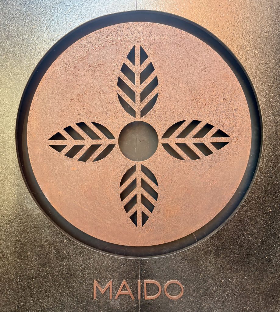maido restaurant sign