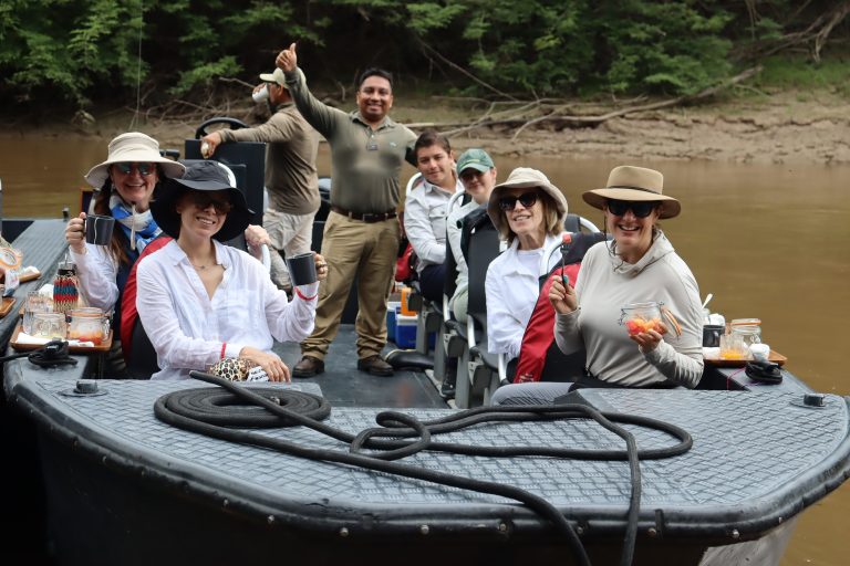 group of tourists aboard the Aqua Nera skiff on amazon river