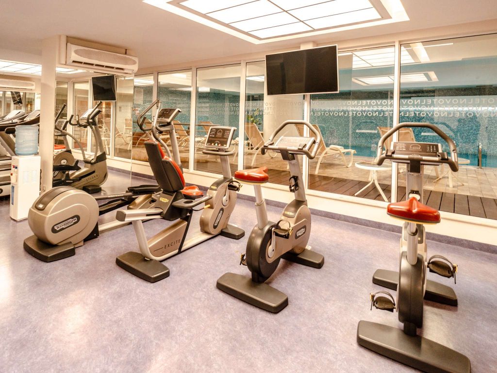 Novotel Lima San Isidro — The gym, overlooking the hotel's indoor pool