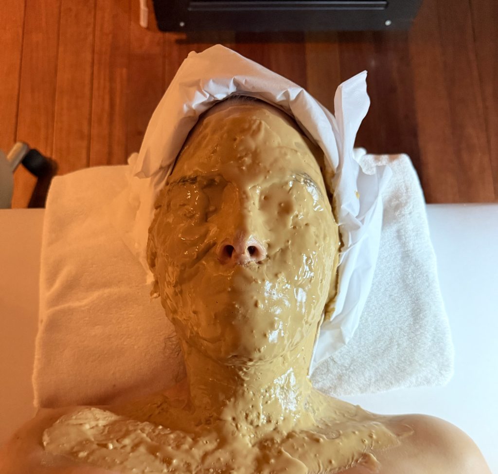 woman receiving a snake venom facial at the Heavenly Spa